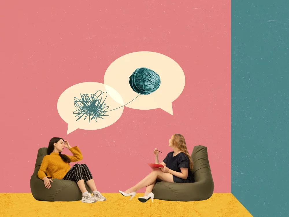Two women engaged in a counselling session, illustrating supportive communication and emotional connection in therapy with Daniela Weetman