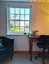 Calm therapy room in Lewes with window view