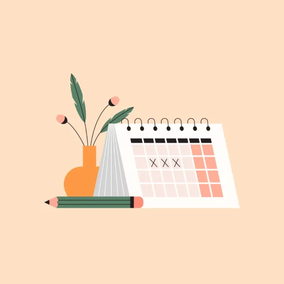 Flat lay of a calendar, pencil, and plant, representing organization and growth in personal development through counselling with Daniela Weetman